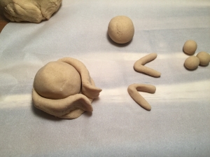 Add the legs, make sure to wet the dough to make it easier to attach